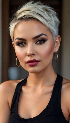 The Shaved Hair style trend's popularity is driven by its edgy and bold look, seen as attractive and a symbol of self-confidence. Shaved Side Pixie Cut, Shaved Sides Hairstyles, 2024 Haircuts, Shaved Pixie, Shaved Hair Cuts, Short Shaved Hairstyles