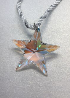 "Beautiful vintage translucent crystal star pendant necklace in good condition measures 1.75\" x 1.5\" width and the rope measures 25\" long." Star Gem Necklace, Vintage Star Necklace For Gift, Crystal Star Necklace, Sparkling Star Necklace, Glass Star Necklace, Star Necklaces, Star Crystal, Eye Drawing Tutorials, Bullet Casing