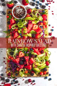 Rainbow salad on a wooden board and a white background. Pizza Sides, Rainbow Salad, Crunchy Salad, Fresh Salad, Rainbow Food, Colorful Salads, Eat The Rainbow, Variety Of Fruits