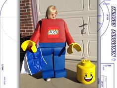 a child dressed up as a lego character holding a blue bag and wearing a red shirt