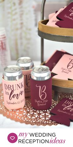 wedding reception ideas for the bride and groom can coolers on a table with pink napkins