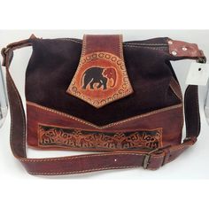 This Is A Beautiful Leather Purse/Shoulder Bag/Handbag With An Adjustable Strap. The Stitching And Details Are Adorable. Really Cute Boho/Hippie Style. Diesel Brown Leather Measurements Are Approximately 13.5" X 3.75" X 9" Tall. In The Photos, The Strap Is 33" And Can Extend One More Inch. One Zippered Inside Pocket We Do Our Very Best To Disclose Everything We See With Photos & Descriptions. Colors May Vary A Shade Or Two Due To The Lighting. New With Tags Diesel Handbags, Diesel Bag, Boho Hippie Style, Tan Purse, White Shoulder Bag, Zip Purse, Designer Crossbody Bags, Black Leather Handbags, Hippie Style