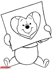 winnie the pooh holding up a heart shaped photo frame