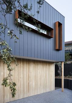 an instagram photo of a house with wood siding