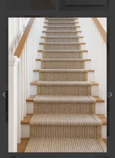 an image of stairs with carpet on them