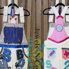 Jewels N Cotton on Instagram: "Highlight your love for bling and glam with sparkle fabric and glitter paint! . Stars, paws, detail lettering, a cross, your name - the options are endless 💙🖤 . We loved designing these with you Sydney!! #senioroveralls #spiritwear #spiritoveralls #jewelsncotton" Homecoming Overalls, Spirit Overalls, Spirit Jeans, Couple Shirt Design, Sparkle Fabric, Couple Shirt, Glitter Paint, Homecoming Mums