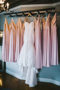 bridesmaid dresses hanging up in the bridal room