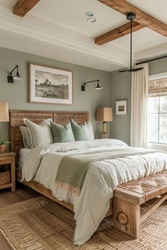 a bedroom with a large bed and wooden beams