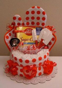 a red and white polka dot cake with utensils