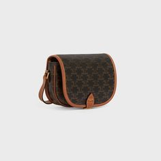 Medium Folco bag in Triomphe Canvas and calfskin - Tan | CELINE Celine Medium Folco Bag, Celine Shoulder Bag, Cross Bag, Celine Bags, Luxury Handbags, Saddle Bags, Louis Vuitton Damier, Louis Vuitton Monogram, Luxury Bags