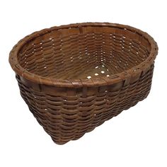 a brown wicker basket on a white background