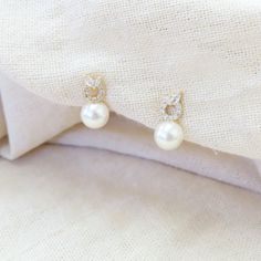 Handmade in S.Korea Detailed & Delicate/Modern Design This Product is : - Top to bottom 1.7cm - Pearl size 7mm - 18k Gold Plated Brass - Sold as a pair We carefully select each Aeolus products to be quality guaranteed and fashionable. Please feel free to contact us if you have any questions. Dainty Gold-plated Pearl Earrings For Formal Occasions, Dainty Gold Plated Pearl Earrings For Formal Occasions, Dainty Pearl Earrings With Cubic Zirconia For Formal Occasions, Dainty Hypoallergenic White Gold Pearl Earrings, Yellow Gold Pearl Earrings With Cubic Zirconia For Gift, Tiny Fine Jewelry Earrings For Wedding, Delicate Gold Plated Round Pearl Earrings, Pearl Charm Earrings With Cubic Zirconia As Gift, Cubic Zirconia Pearl Earrings