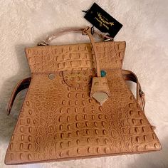 Vivienne Westwood Kelly Medium Handbag; Handbag Made Of Leather With Faux Croc Texture.; Front Zip-Around Closure.; Flat Top Handle.; Removable And Adjustable Crossbody Strap.; Brand Name Foil Embossed At Front. ; Brand Logo Hang Tag.; Flat Base To Provide Upright Structure. ; Lined Interior Features Back-Wall Zip Pocket And Front-Wall Slip Pockets.; Made In Italy. Brand New Purchased At A Sample Sale Luxury Brown Handheld Bags, Luxury Brown Satchel For Shopping, Formal Natural Color Top Handle Bag, Elegant Natural Satchel With Detachable Strap, Luxury Handheld Brown Satchel, Luxury Brown Handheld Satchel, Luxury Brown Double Handle Shoulder Bag, Brown Everyday Luxury Shoulder Bag, Brown Luxury Shoulder Bag