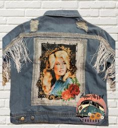 This listing is NOT for adult sizes Made to order custom denim jacket.  Dolly Graphic & can have fringed sleeves or no fringe Rhinestone placement may vary, if you want a certain placement around graphic, please add to notes.  Front of denim can have rhinestones added, leave in notes or I will assume to leave front blank. Denim jackets are done in all different brands of jackets. If you have a certain brand that fits best for you, please message before ordering & I can check to see if I have in Bleached Jacket, Dolly Parton Shirt, Bleached Denim Jacket, Customised Denim Jacket, Custom Jean Jacket, Upcycled Denim Jacket, Diy Denim Jacket, Girls Denim Jacket