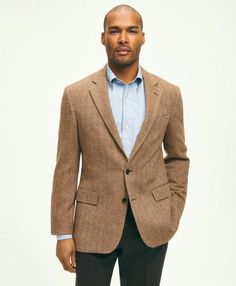 A classic piece and designer favorite, our herringbone sport coat features Italian-woven wool in neutral tones that go just as well with your oxford shirts as they do with your dress styles. Our signature attention to detail gives a natural shoulder drape, a meticulous bufferfly lining and the kind of craftsmanship you can only find here..CLASSIC FIT: Our average fit across chest, body and sleeves. (formerly known as Regent Fit).2-button; side vents; half lined; finished sleeves.100% Wool.Dry Cl Tailored Herringbone Outerwear For Semi-formal Occasions, Classic Herringbone Outerwear With Lapel Collar, Classic Outerwear With Herringbone Pattern And Lapel Collar, Tailored Fall Sport Coat For Semi-formal Occasions, Timeless Fall Tweed Jacket With Suit Collar, Timeless Spring Sport Coat With Welt Pockets, Timeless Single Breasted Tweed Jacket For Fall, Timeless Single-breasted Tweed Jacket For Fall, Classic Notch Lapel Blazer With Herringbone Pattern