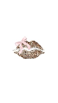 a pair of leopard print lips with pink bows