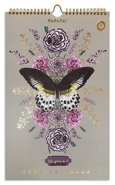 a card with an image of a butterfly and flowers on the front, in purple