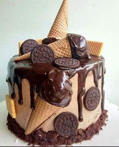 an ice cream cake with oreo cookies on top