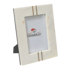 a white and gold frame with the words cascadacor on it in front of a white background