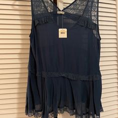 Brand New With Original Tags! Let Me Know If You Have Any Questions, Or Concerns! Chic Blue Lace Top, Blue Bohemian Lace Top, Sleeveless Blue Lace Tops, Blue Lace Blouse With Lace Trim, Blue Lace Sleeveless Tops, Lace Ruffle Camisole Tank Top, Blue Bohemian Cami Tank Top, Free People Corset Cami, Chic V-neck Ruffled Camisole