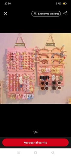 a pink wall hanging with several pairs of sunglasses on it