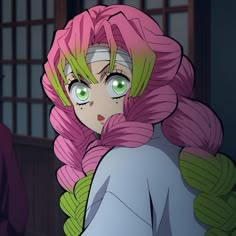 an anime character with green eyes and pink hair