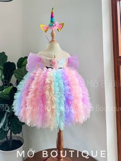 "Enchanting Baby Unicorn Sequin Tutu: Sparkling Birthday & Prom Dress for Your Little Princess in Unicorn Theme" SIZE: Newborn to 5Y (Please check our Sizing Picture for more details) Your Purchase will include The Baby/Kid Dress and a FREE Headband as Our Gift for your Princess   --------------------------------------------------------------------------------------------------------- HIGHLIGHTS: Handmade, Sequin, Tulle and Mesh Fabric, Lace, Back Bow, Multi Layers.  Sleeves: Puff and Off-the-sh Unicorn Dresses For Kids, Unicorn Birthday Dress, Twin Halloween, Kid Dress, Festive Dress, Green Prom, Unicorn Dress, Theme Dress, Unicorn Theme