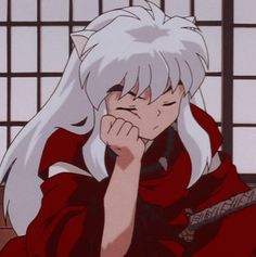 an anime character with white hair sitting in front of a window and looking at something