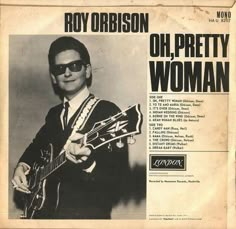 ray orbison on the cover of his album oh pretty woman, which features an image of