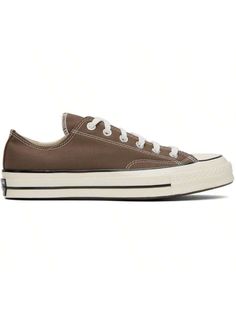 Converse 
Brown Chuck 70 Sneakers 
Low-top canvas sneakers in brown. 
. Rubber cap toe 
. Lace-up closure 
. Eyelets at inner side 
. Padded Ortholite™ footbed 
. Rubberized logo patch at heel 
. Treaded rubber sole 
. Contrast stitching in white 
Supplierlor: Squirrel friend/Egret/Black 
Upper: textile. Sole: rubber. 
Made in Viet Nam. 
231799F128031 
Brown Chuck 70 Sneakers default         Sports & Outdoor Shoes, size features are:Bust: ,Length: ,Sleeve Length: Cheap Brown Women's Sneakers, Cheap Brown Low-top Sneakers, Womens Brown Converse, Low Top Brown Converse, Brown Low-top Cotton Sneakers, Converse Brown, Brown Converse, Converse Low, Casual Athletic Shoes