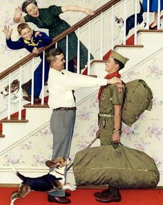 two men and a dog are standing in front of a stair case with luggage on it