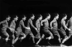 a group of men in uniforms running together