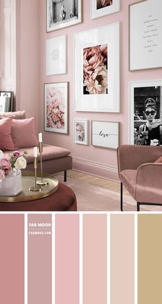 a living room with pink walls and pictures on the wall