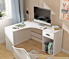 a corner desk with a computer on it