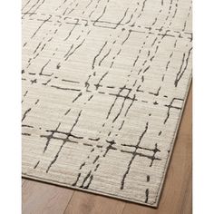 a white rug with black lines on it