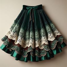 a green and white skirt hanging on the wall