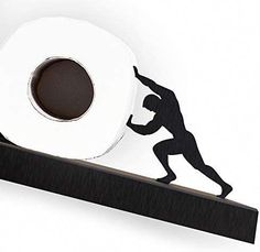 a toilet paper holder with a black and white silhouette of a man holding a roll of toilet paper