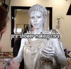 a woman is looking at a mannequin with words on it that read pre - shower makeup core