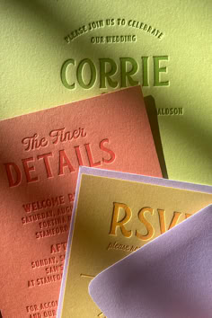 three different colored wedding cards with the word corrie on one side and the other