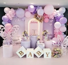 a baby shower party with balloons and decorations