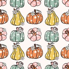 many different colored pumpkins on a white background