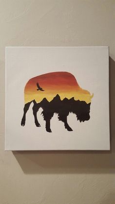 a painting of a bison with the sun setting in the background and a bird flying over it