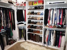 the closet is full of shoes and clothes