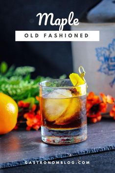 an old fashioned cocktail is garnished with oranges and lemon wedges for the perfect fall drink