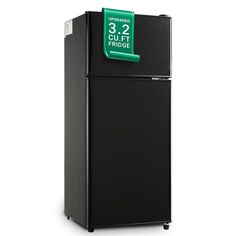 a black refrigerator freezer sitting on top of a white floor next to a sign that says 32 out of fridge