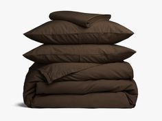 four pillows stacked on top of each other