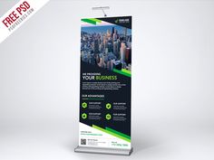 a roll up banner with an image of a cityscape in the back ground