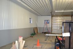 the inside of a storage room with metal buildings