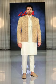 Check out the fully embroidered and hand embellished open front golden prince coat, paired with kurta pajama and shoes. Our stunning ensemble on display at the London Lifestyle Show on 17-18 June 2023. Luxury Single Breasted Nehru Jacket For Winter, Gold Embroidered Straight Kurta Bandhgala, Designer Bandhgala With Gold Embroidery Straight Kurta, Elegant Designer Outerwear For Diwali, Gold Sherwani With Dabka Work Straight Kurta, Gold Embroidered Bandhgala Straight Kurta, Designer Nehru Jacket With Gold Embroidery For Eid, Bollywood Style Nehru Jacket With Gold Embroidery For Eid, Gold Long Sleeve Kurta For Eid