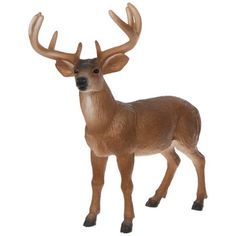 a toy deer with antlers on it's head is standing in front of a white background